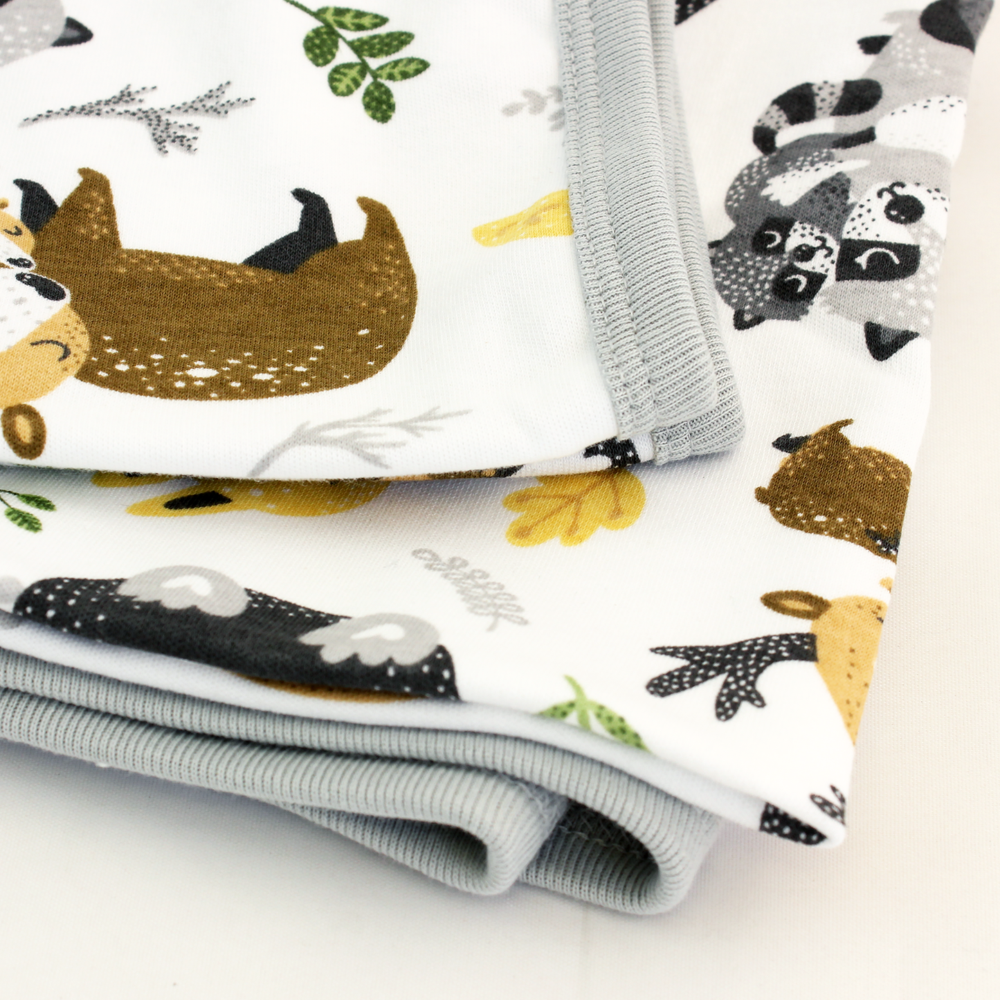 Wrapped with Endanzoo Organic Baby Swaddle Blanket - Safari Hugs