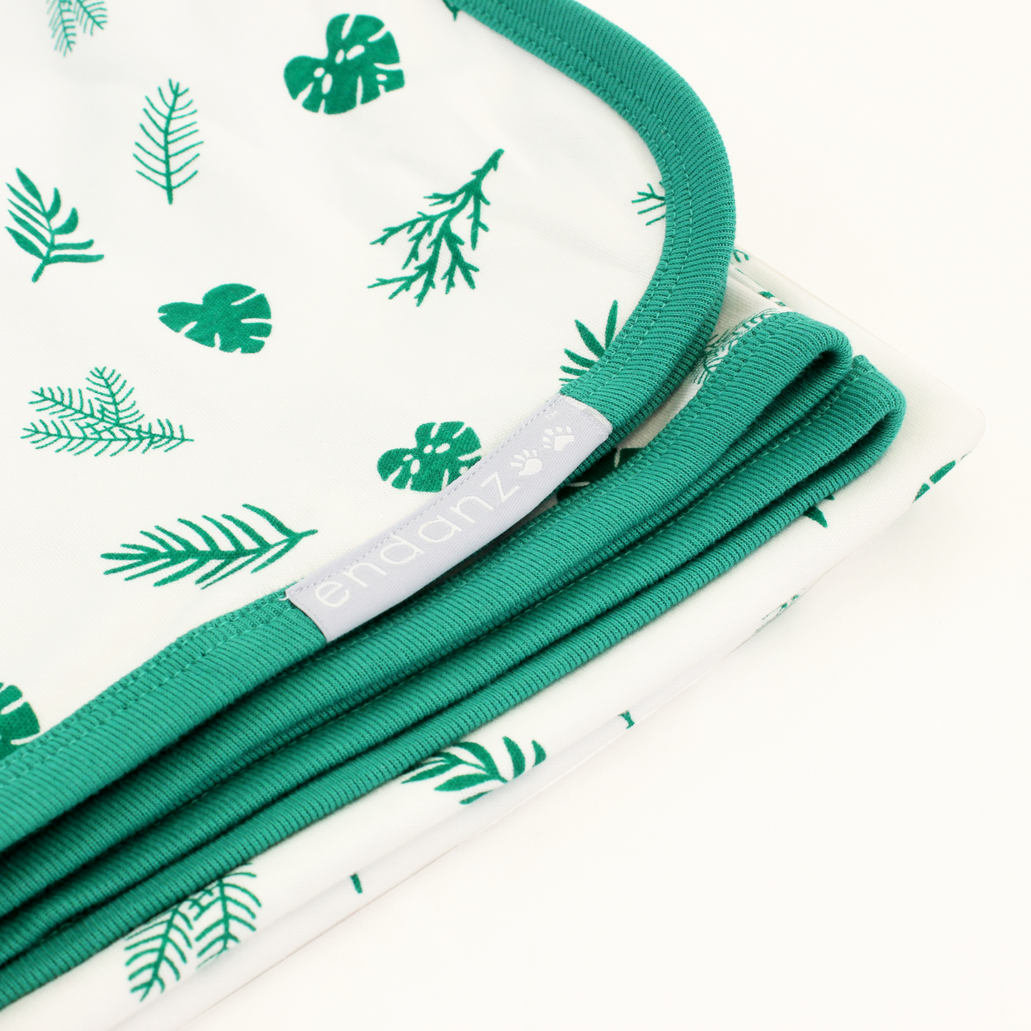 Wrapped with Endanzoo Organic Baby Swaddle Blanket - Tropical Leaves