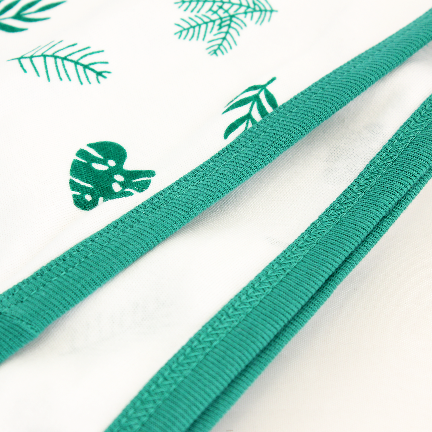 Wrapped with Endanzoo Organic Baby Swaddle Blanket - Tropical Leaves