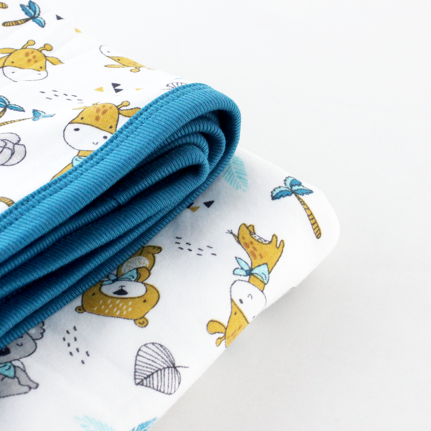 Wrapped with Endanzoo Organic Baby Swaddle Blanket - Jungle Cuties